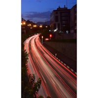 a long exposure image of a city at dusk